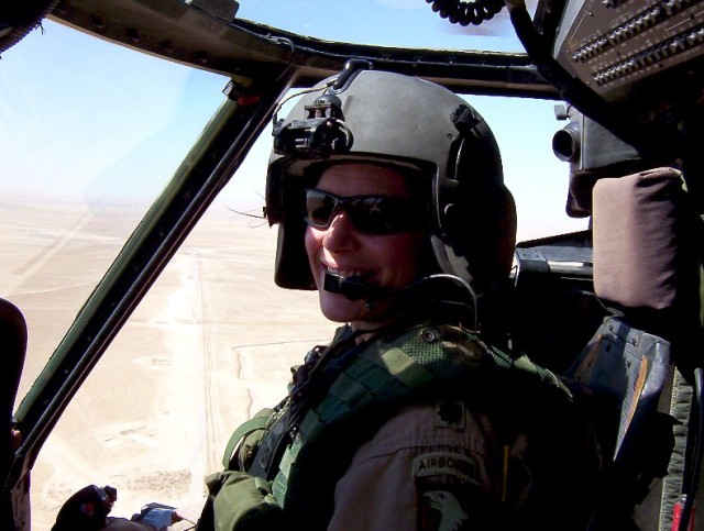 Lt. Col. Laura Richardson flies a UH-60 Black Hawk helicopter in Iraq during Operation Iraqi Freedom Sept. 20, 2003. She commanded an assault helicopter battalion in combat in the 101st Airborne Division (Air Assault).