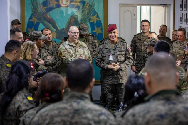 U.S. Army Brig. Gen. John LeBlanc, left, deputy commanding general of U.S. Army Southern European Task Force, Africa (SETAF-AF), discusses the start of African Lion 2024 (AL24) with Tunisian Senior Col. Tawfik Ghali, AL24 exercise director, during the opening ceremony at El Aouina Air Base, Tunisia, April 29, 2024. AL24 marks the 20th anniversary of U.S. Africa Command’s premier joint exercise led by SETAF-AF, running from April 19 to May 31 across Morocco, Ghana, Senegal and Tunisia, with over 8,100 participants from 27 nations and NATO contingents. 